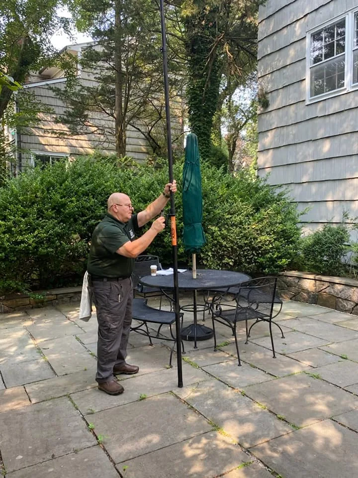 Longs GCS inspector examining a home exterior in New York